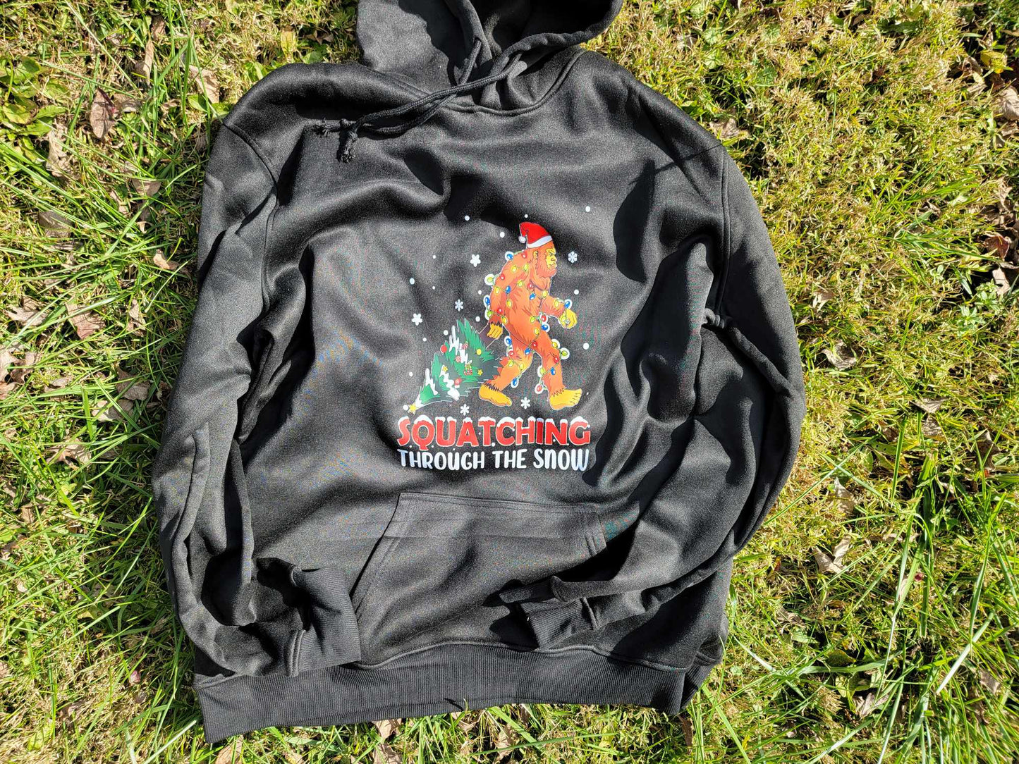 Squatching Through the Snow Sasquach Christmas Hoodie