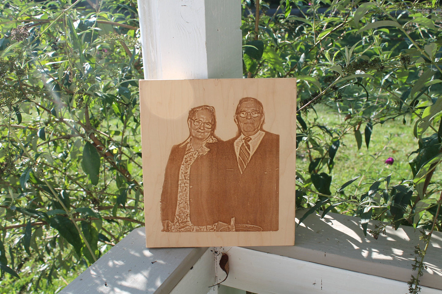 laser etched photo on wooden surface