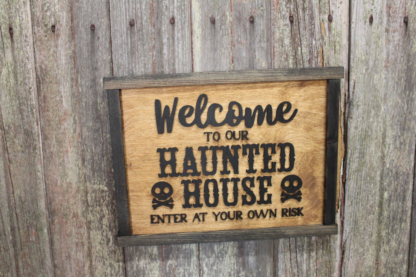 Welcome to Our Haunted House Sign Skull Crossbones Enter at Your Own Risk Halloween Scary 3D Raised Text Country Farmhouse Cabin Wood Decor