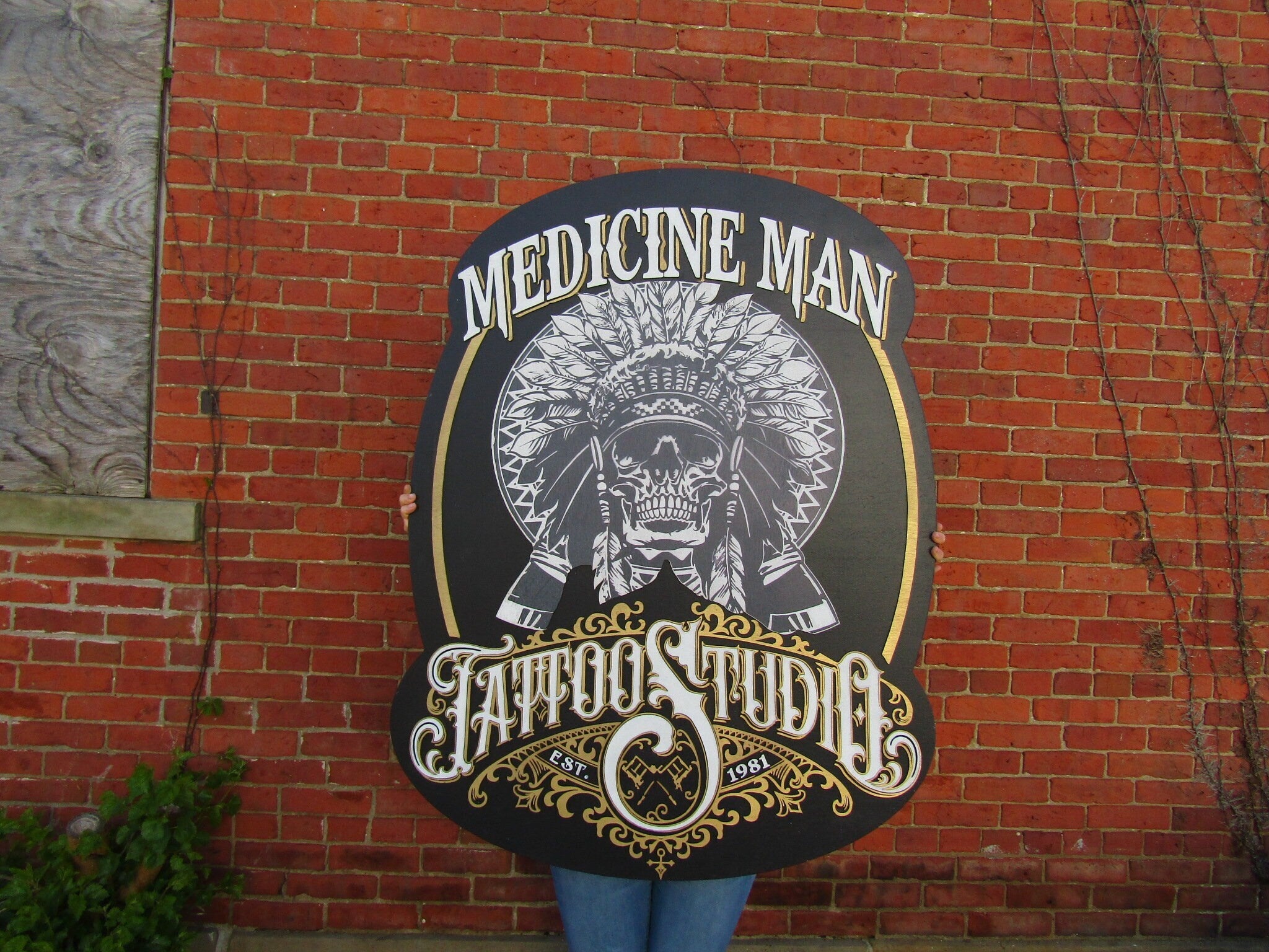 Nemesis Tattoo studio sign in Camden, London. (Photo by Dave Rushen / SOPA  Images/Sipa USA Stock Photo - Alamy