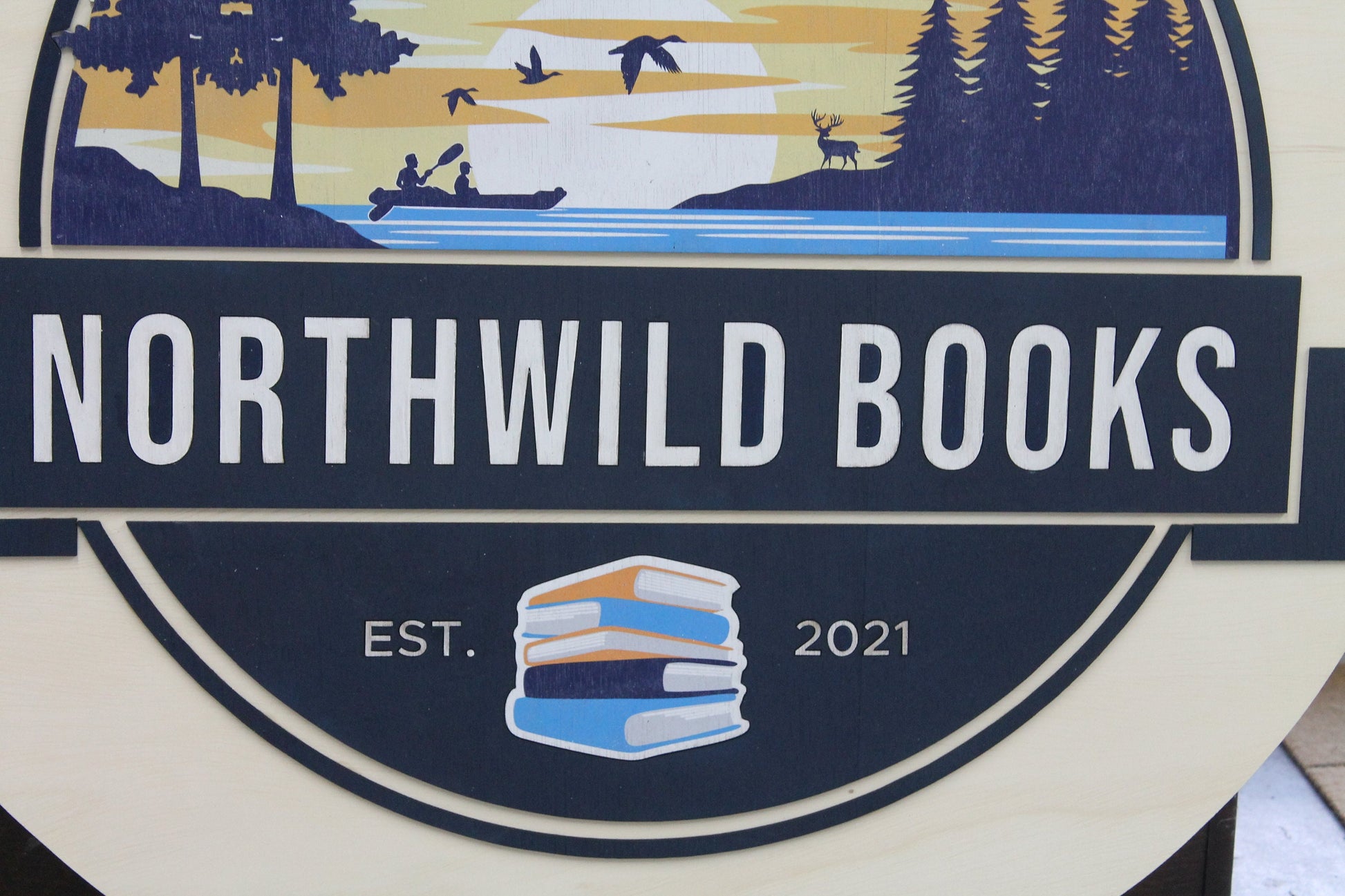 Book Store Small Business Logo Custom Round Sign Printed In Color Raised Lettering Sunset Airplane Commerical Store Front Signage