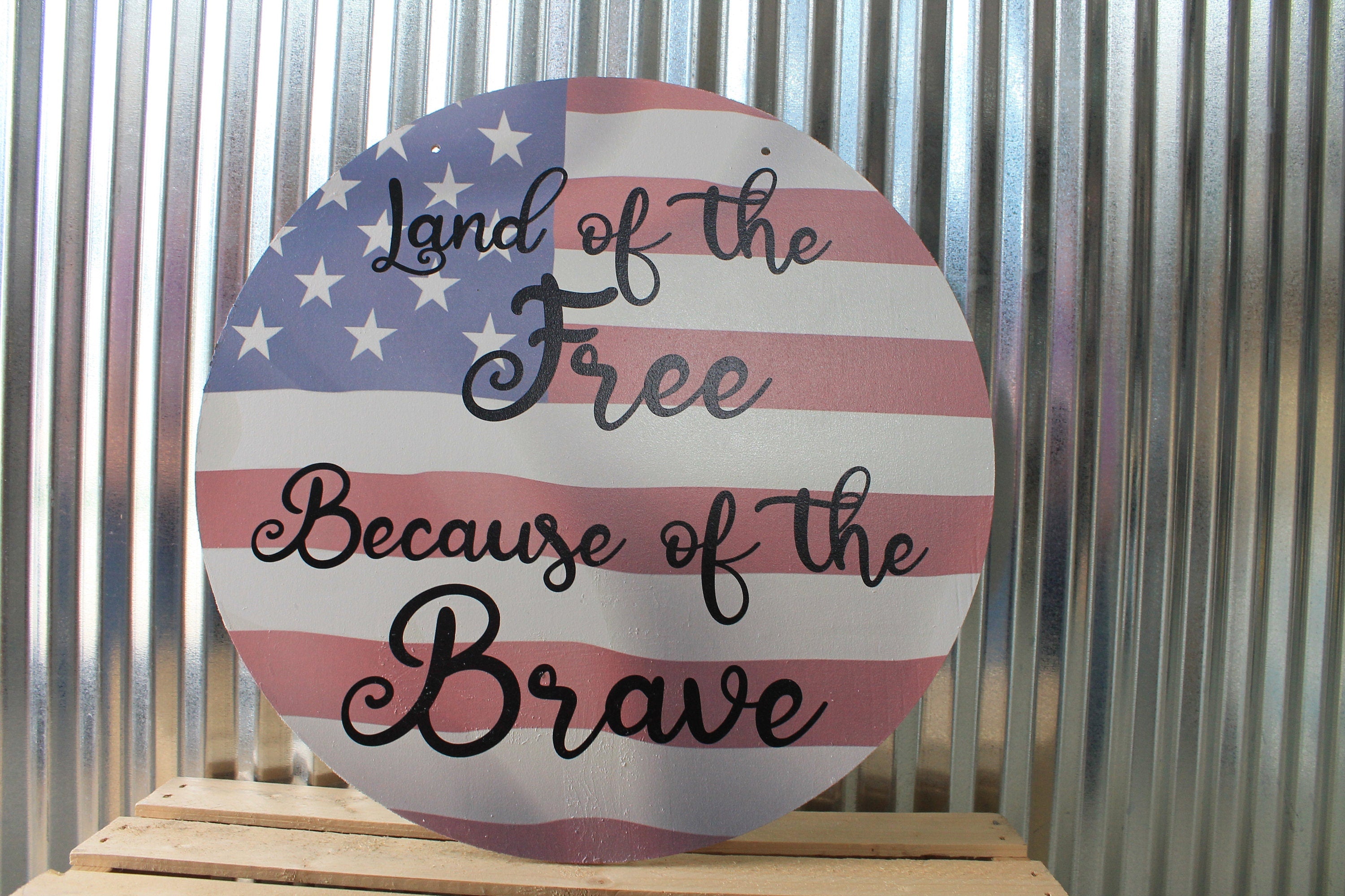 Buying American flag wood round sign